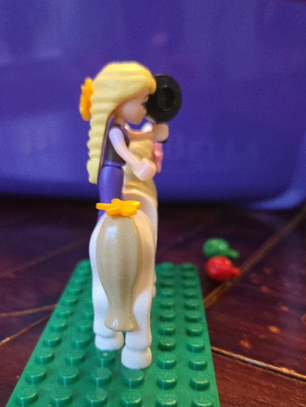 LEGO Rapunzel mini figure riding her horse, Maximus.